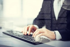 business, education and technology concept - man hands typing on keyboard